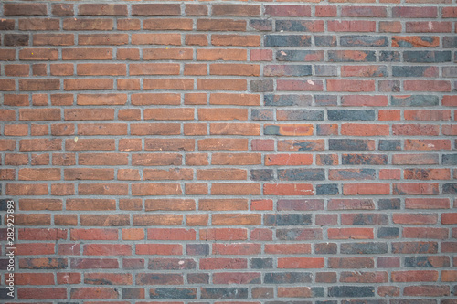 Brown red color brick wall texture, background