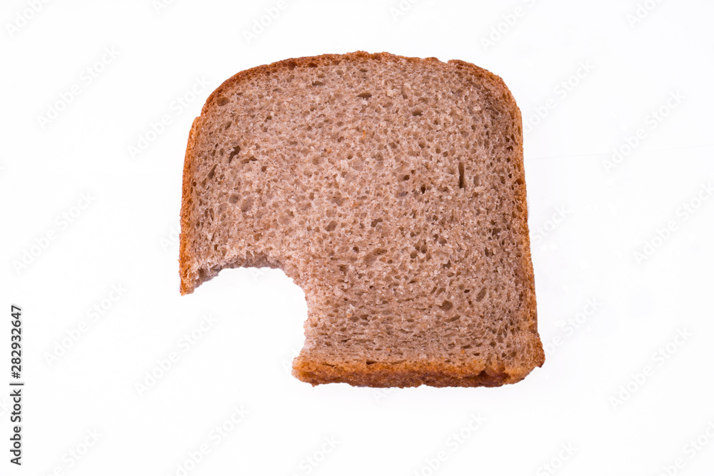 bitten bread slice - sliced bread slices isolated on a white background bitten bread slice - sliced bread slices isolated on a white background