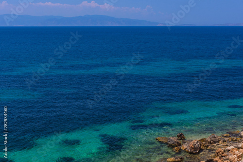 The clear and blue waters of Mediterranean sea in the Saronic gulf, Greece. © Aron M  - Austria