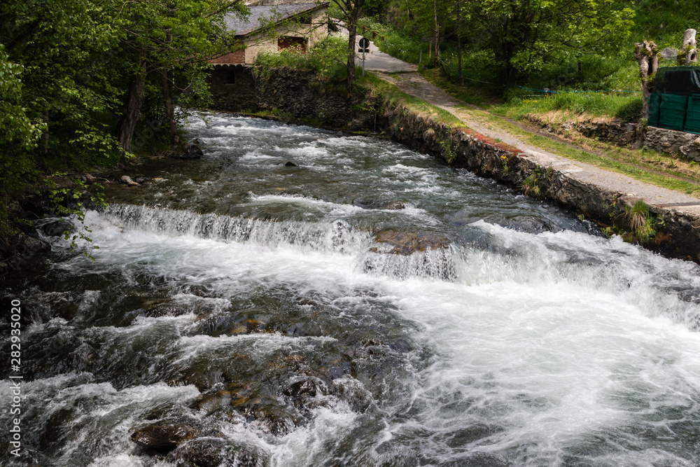 Fototapeta premium Waterfall on the river Valira d'Orient in Andorra.