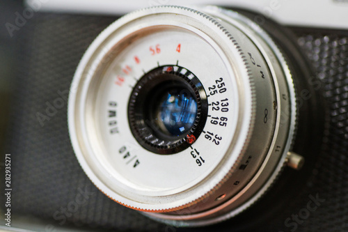 Vintage camera lens close-up. Close up photo of old camera lens photo