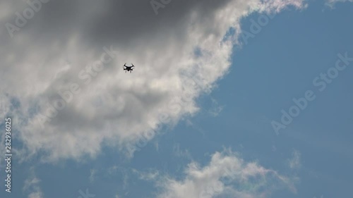 Wallpaper Mural Drone flying in the sky. Quadcopter floats in the air. Torontodigital.ca