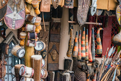 Variety of African souvenirs exposed for sale in local market © Yakov