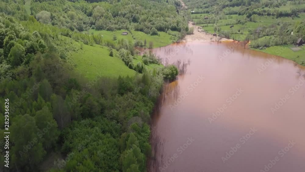 Forward flight with tilt up of the Apuseni Mountains, Geamana, and the natural disaster of pollution and poisons at Rosia Montana Forward flight with tilt up of the Apuseni Mountains, Geamana, and the natural disaster of pollution and poisons at Rosia Montana