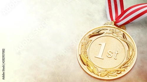 Gold medal with ribbon on background