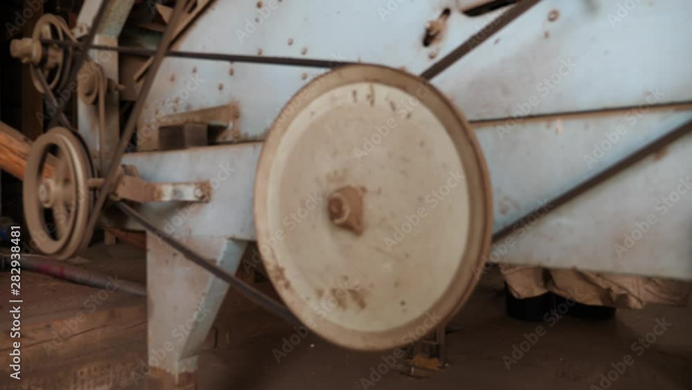 old grain cleaning machine spinning rubber belts to work old grain cleaning machine spinning rubber belts to work
