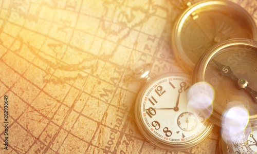 Bintage watch on world map, close-up photo