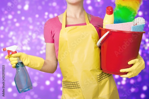 Beautiful Young Woman Housewife with Cleaning products © BillionPhotos.com