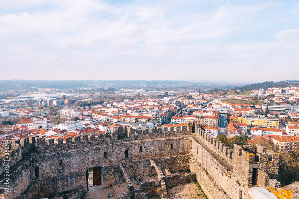 the stone walls of the fortress defense. city view. the sky and
