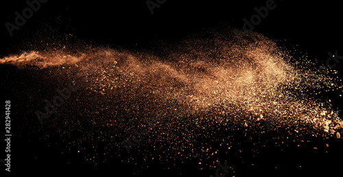 Tableau sur toile a shot from a firearm, an explosion of gunpowder on a black background, a bright