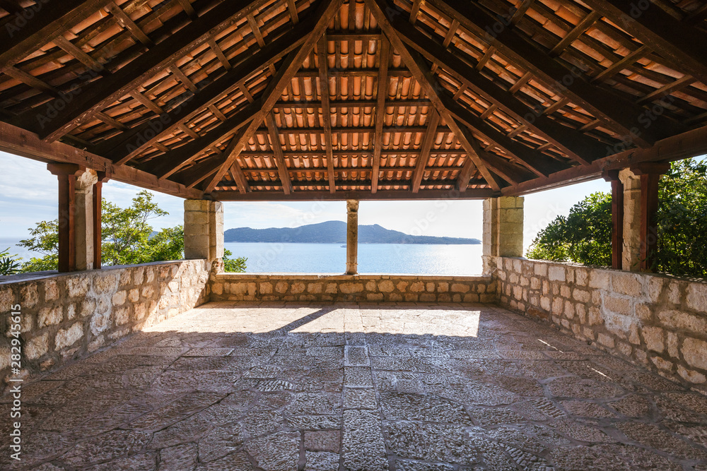 The way to the pavilion with sea view at the botanical garden Arboretum in Trsteno, Croatia. Game of Thrones film location The way to the pavilion with sea view at the botanical garden Arboretum in Trsteno, Croatia. Game of Thrones film location