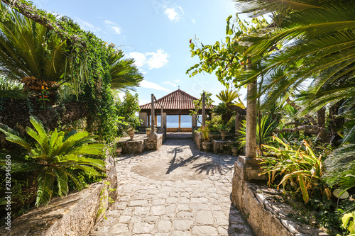Fototapeta Naklejka Na Ścianę i Meble -  The way to the pavilion with sea view at the botanical garden Arboretum in Trsteno, Croatia. Game of Thrones film location