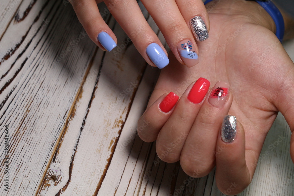 Closeup photo of a beautiful female hands with elegant manicure Closeup photo of a beautiful female hands with elegant manicure