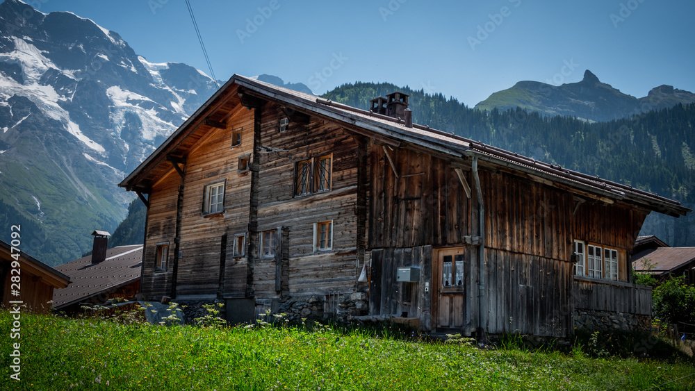 Typical wooden barns in Switerland - obrazy, fototapety, plakaty 