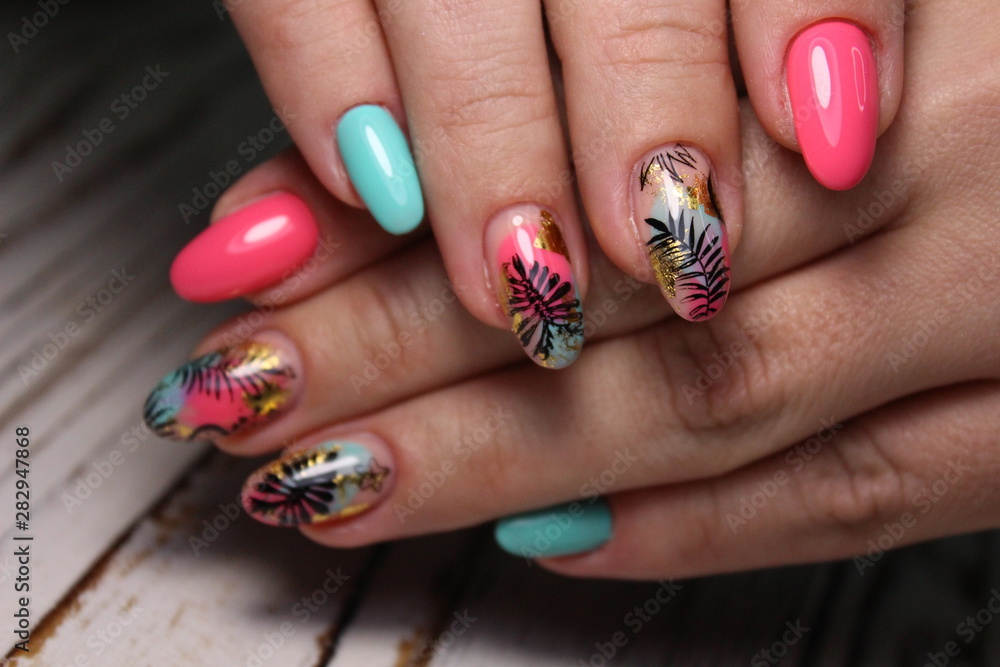 fashionable beige manicure with a silver design fashionable beige manicure with a silver design