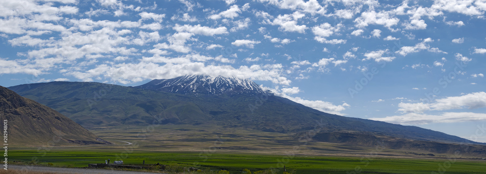 Breathtaking view of Mount Ararat, Agri Dagi, the highest mountain in the extreme east of Turkey accepted in Christianity as the resting place of Noah's Ark, a snow-capped and dormant compound volcano