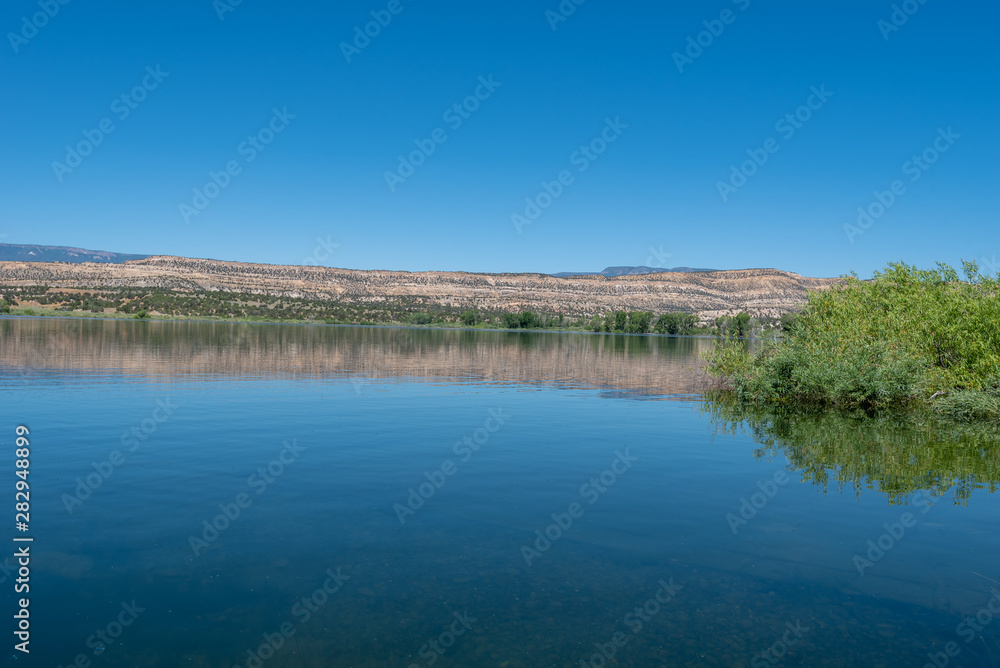 Landscape of lake in the Escalante Petrified Forest State Park in Escalante, Utah