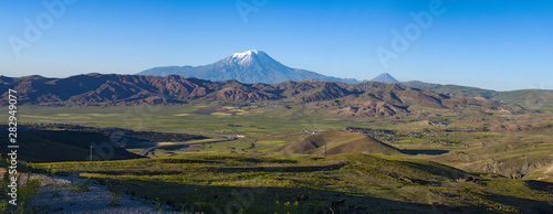 Breathtaking view of Mount Ararat, Agri Dagi, the highest mountain in the extreme east of Turkey accepted in Christianity as the resting place of Noah's Ark, a snow-capped and dormant compound volcano © Naeblys