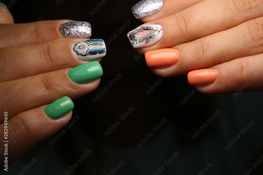fashion manicure of nails on a beautiful background fashion manicure of nails on a beautiful background