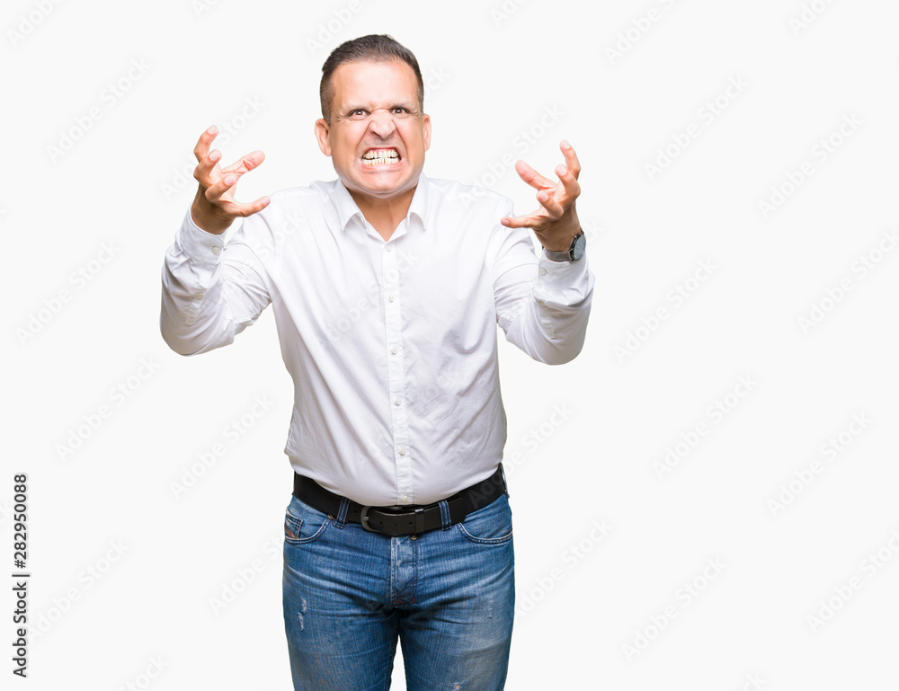 Middle age arab elegant man over isolated background Shouting frustrated with rage, hands trying to strangle, yelling mad Middle age arab elegant man over isolated background Shouting frustrated with rage, hands trying to strangle, yelling mad