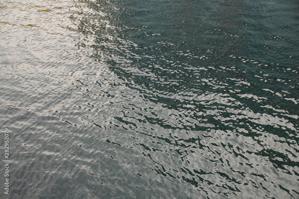 beautiful texture of sea water surface with light ripples, blank for designer, blank for postcard, copy space beautiful texture of sea water surface with light ripples, blank for designer, blank for postcard, copy space