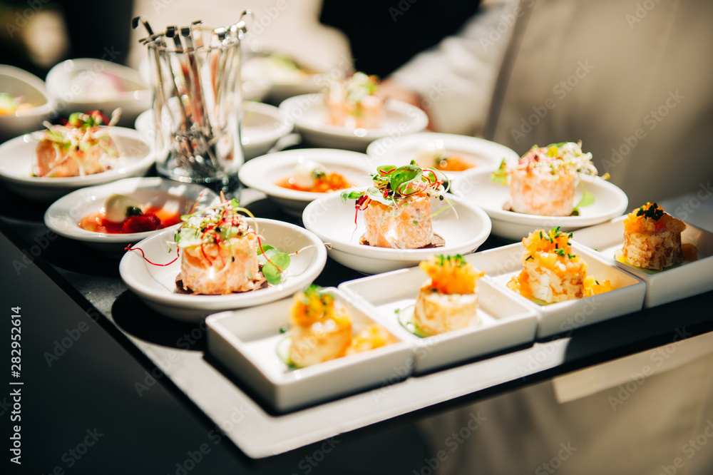 Salmon tatrare in small plates, catering event, banquet food Salmon tatrare in small plates, catering event, banquet food