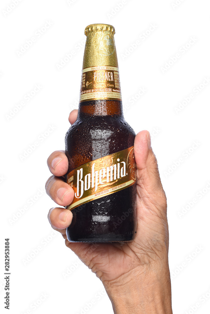 IRVINE, CALIFORNIA - APRIL 26, 2019: Closeup of a hand holding a bottle of  Bohemia Beer. From Cerveceria Cuauhtemoc-Moctezuma, founded in 1890, now a  subsidiary of Heineken International. Photos | Adobe Stock