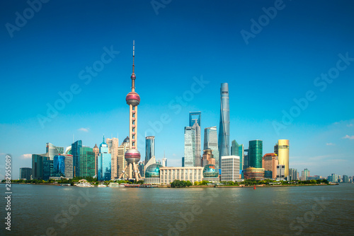 Shanghai lujiazui finance and business district trade zone skyline with cruise ship  Shanghai China
