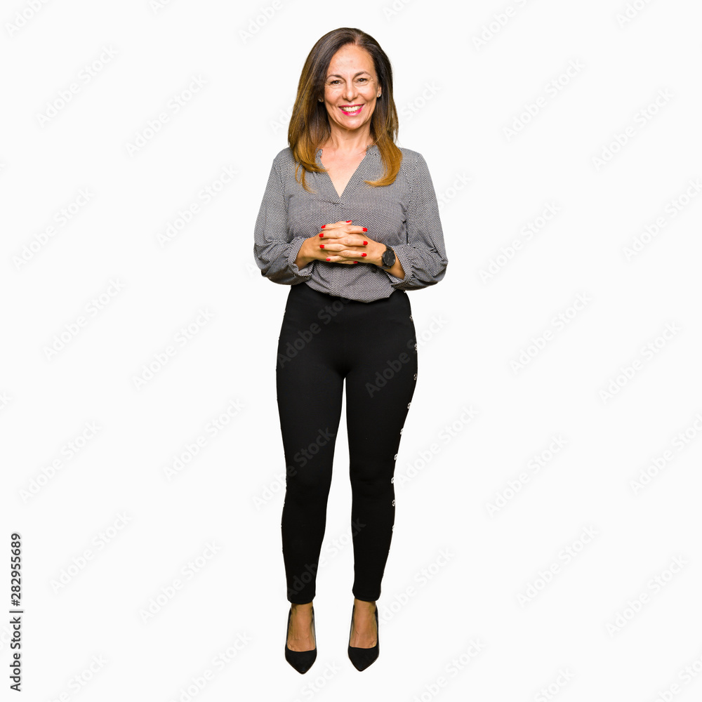 Beautiful middle age business woman Hands together and fingers crossed smiling relaxed and cheerful. Success and optimistic Beautiful middle age business woman Hands together and fingers crossed smiling relaxed and cheerful. Success and optimistic