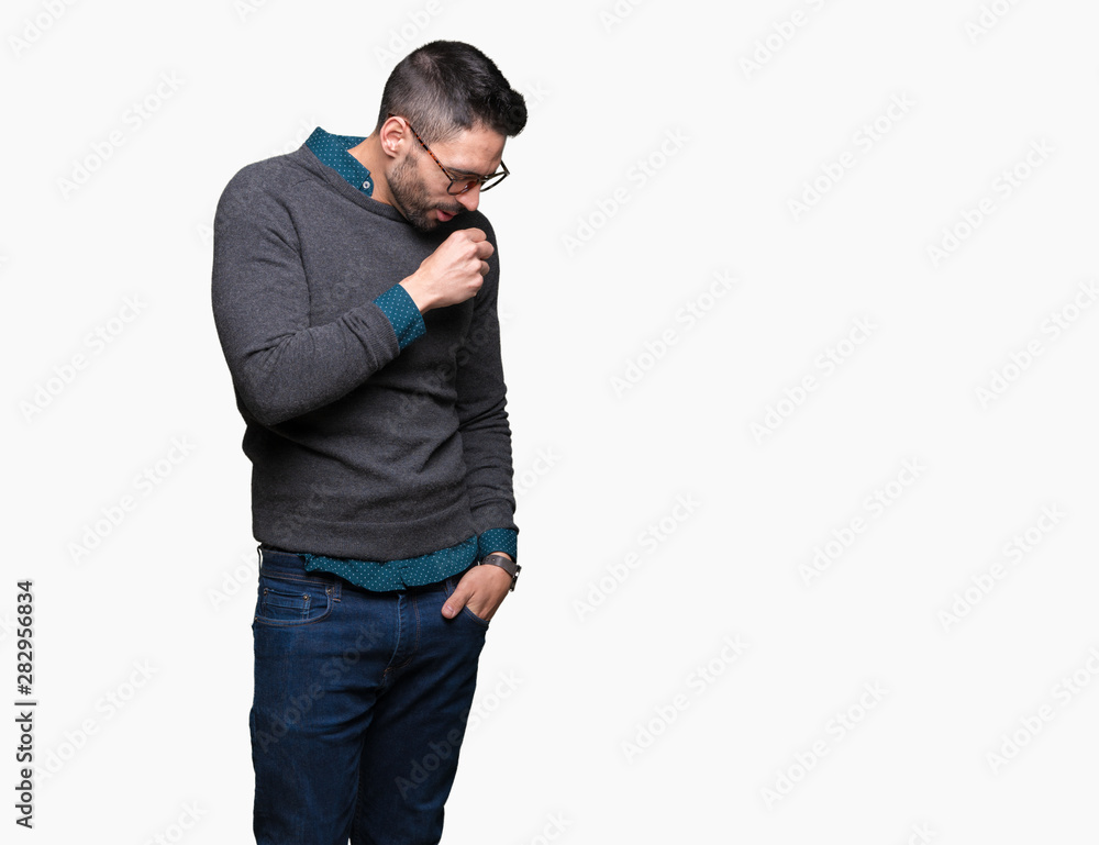 Young handsome man wearing glasses over isolated background feeling unwell and coughing as symptom for cold or bronchitis. Healthcare concept. Young handsome man wearing glasses over isolated background feeling unwell and coughing as symptom for cold or bronchitis. Healthcare concept.