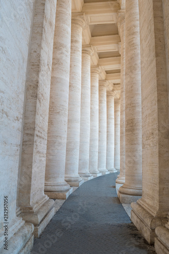 Inside the colossal Doric colonnades that delimit St. Peter's Square in the Vatican