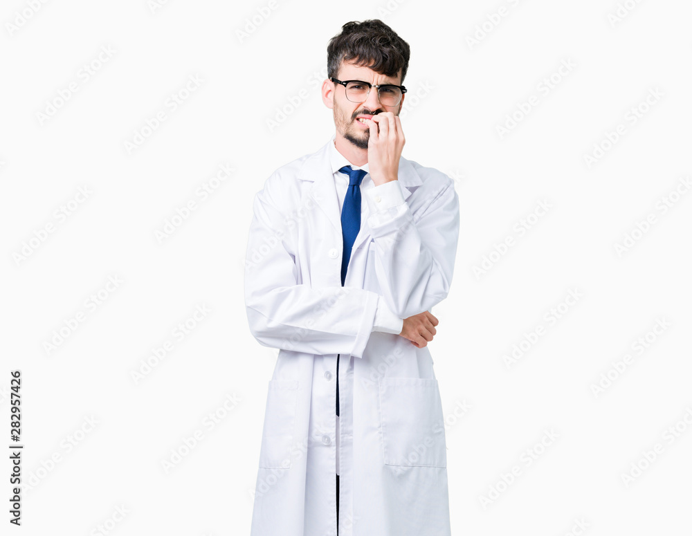Young professional scientist man wearing white coat over isolated background looking stressed and nervous with hands on mouth biting nails. Anxiety problem. Young professional scientist man wearing white coat over isolated background looking stressed and nervous with hands on mouth biting nails. Anxiety problem.
