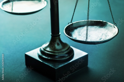 Fotografie Law scales justics scale weighing old lawyer litigation
