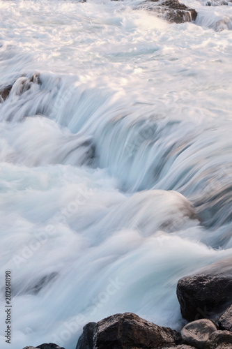 Water flow motion over rocks during big swell in Australia © Orion Media Group