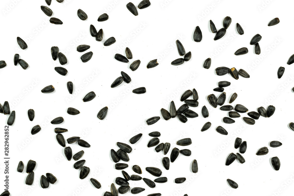 Sunflower seeds, background or texture isolated on white. lose-up. Sunflower seeds, background or texture isolated on white. lose-up.