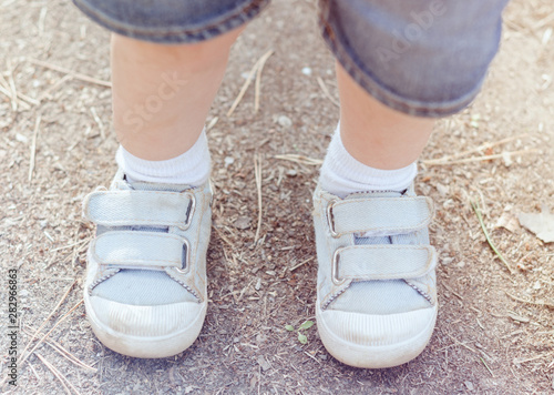 little baby feet in sneakers
