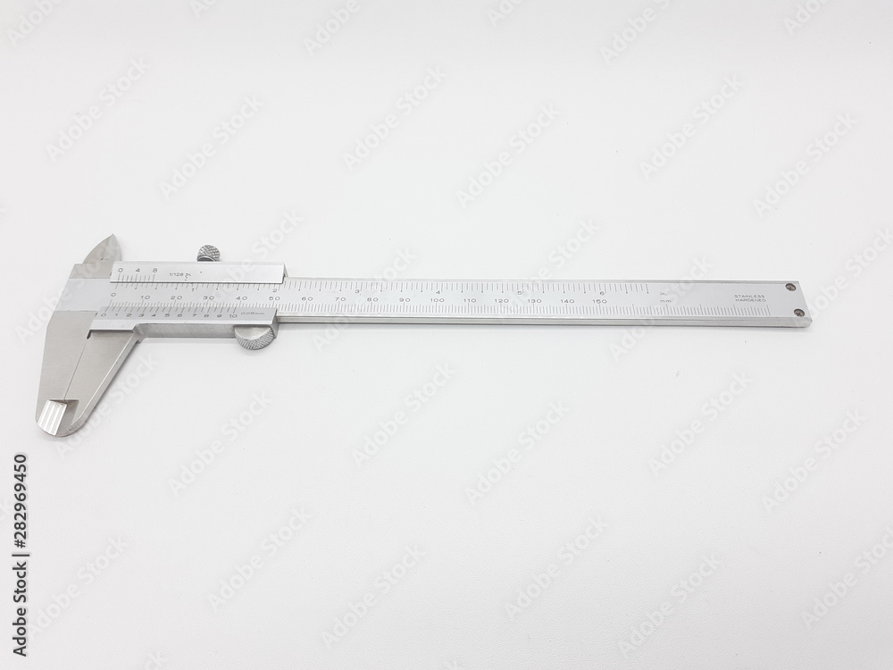 White Silver Metallic Calliper for Engineering Precision Scale Measurements in White Isolated Background White Silver Metallic Calliper for Engineering Precision Scale Measurements in White Isolated Background