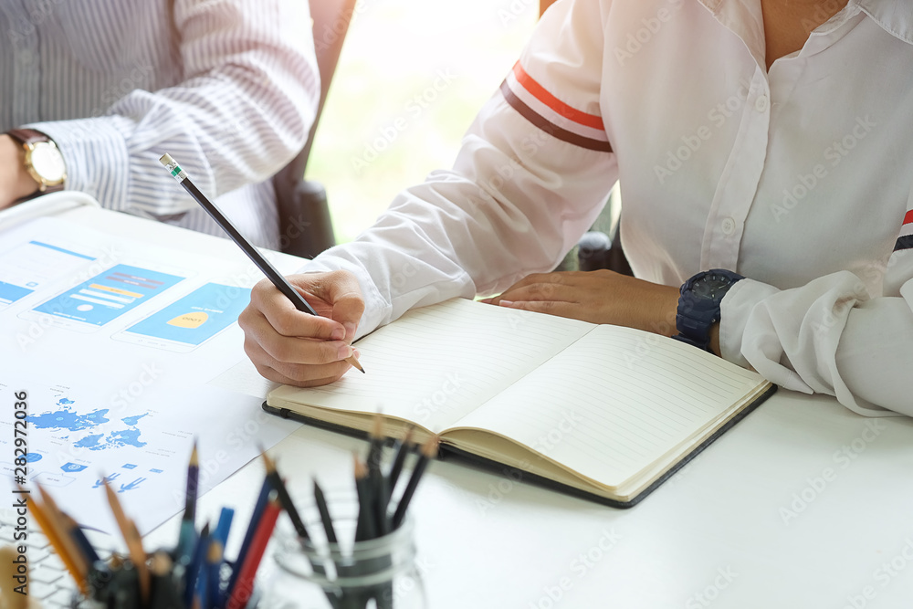 Business working in office with documents and laptop people Consulting and business planning. Business working in office with documents and laptop people Consulting and business planning.
