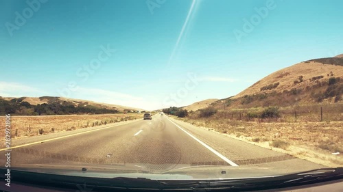 Warm 60F Dash Cam Style View Driving Down California Highway photo