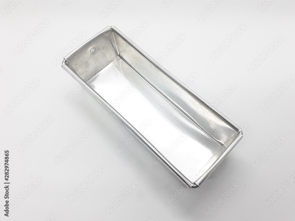 Empty Pie and Bread Shiny Aluminium Template in White Isolated Background Empty Pie and Bread Shiny Aluminium Template in White Isolated Background
