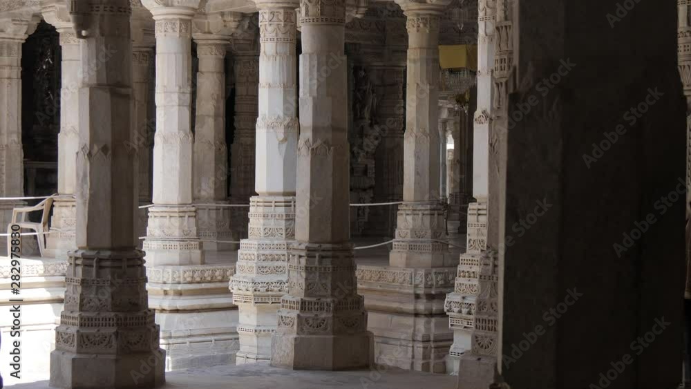 Ranakpur Jain temple in India - ornate detail of white marble carvings Ranakpur Jain temple in India - ornate detail of white marble carvings