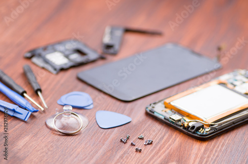 Cell phone repair. Smartphone parts and tools for recovery