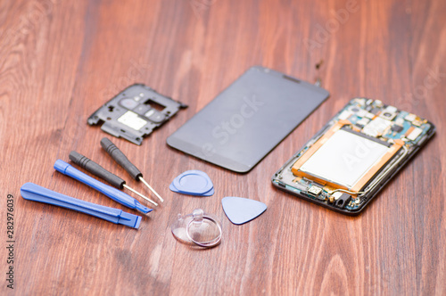 Cell phone repair. Smartphone parts and tools for recovery