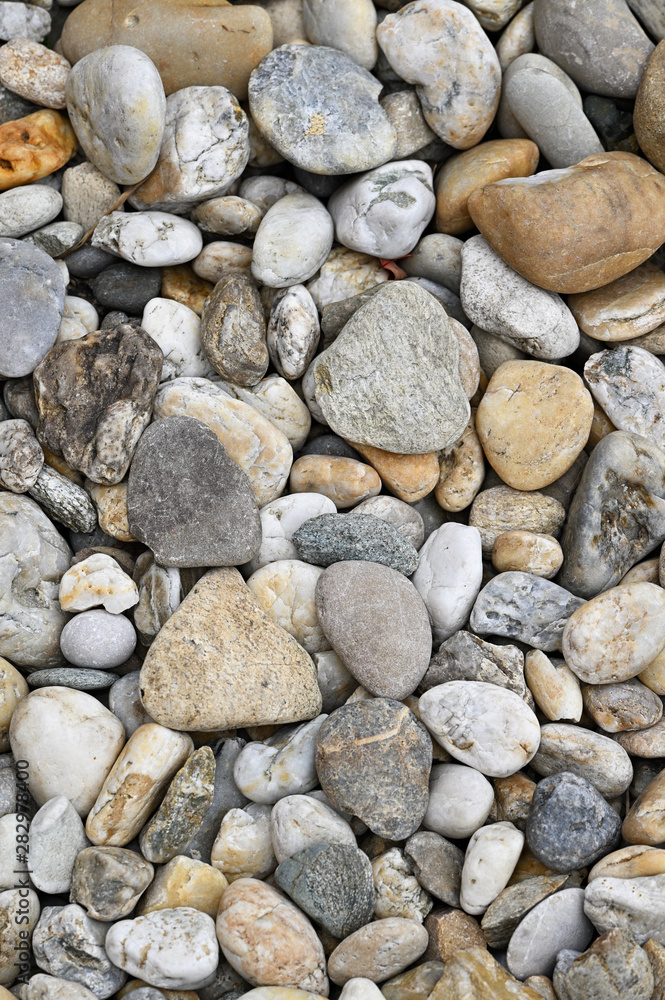 Colorful machined stones on the ground. Colorful machined stones on the ground.