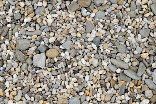 Colorful machined stones on the ground.