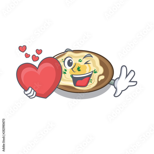 With heart hummus on the a cartoon plate
