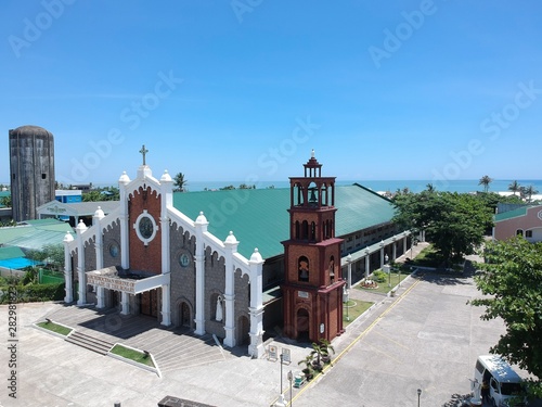 Aparri, Cagayan, Philippines - June 3, 2019: aerial view or drone shot of Archdiocesan Shrine of Our Lady of the Rosary, church photo