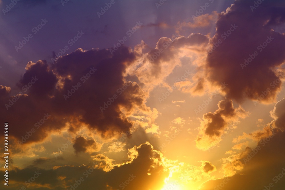 Obraz premium wonderful unreal colorful fantasy sunset or sunrise clouds on the sky for using in design as background.