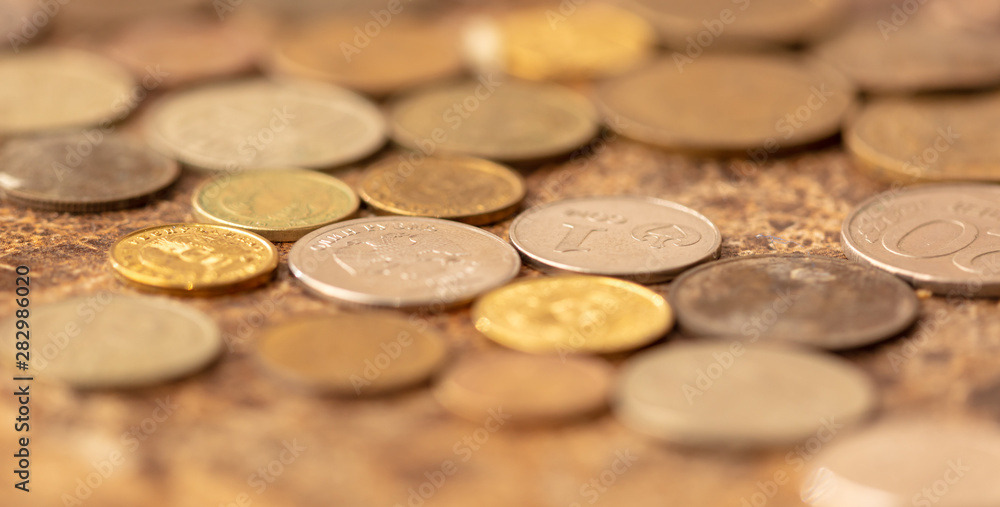 Old coins on the table as background Old coins on the table as background