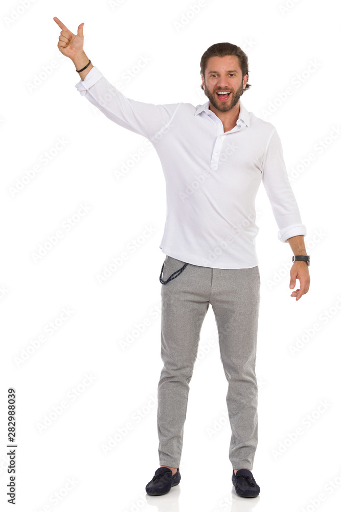 Handsome Man Is Pointing Up And Talking Handsome Man Is Pointing Up And Talking